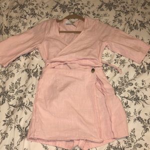 Pink urban romper/dress with open middle!